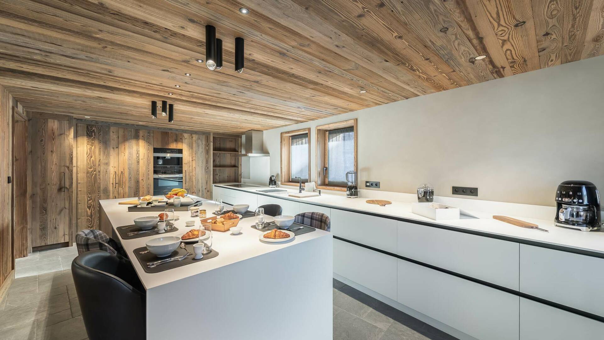 fully equipped modern kitchen with counter bar