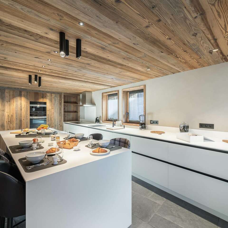 fully equipped modern kitchen with counter bar