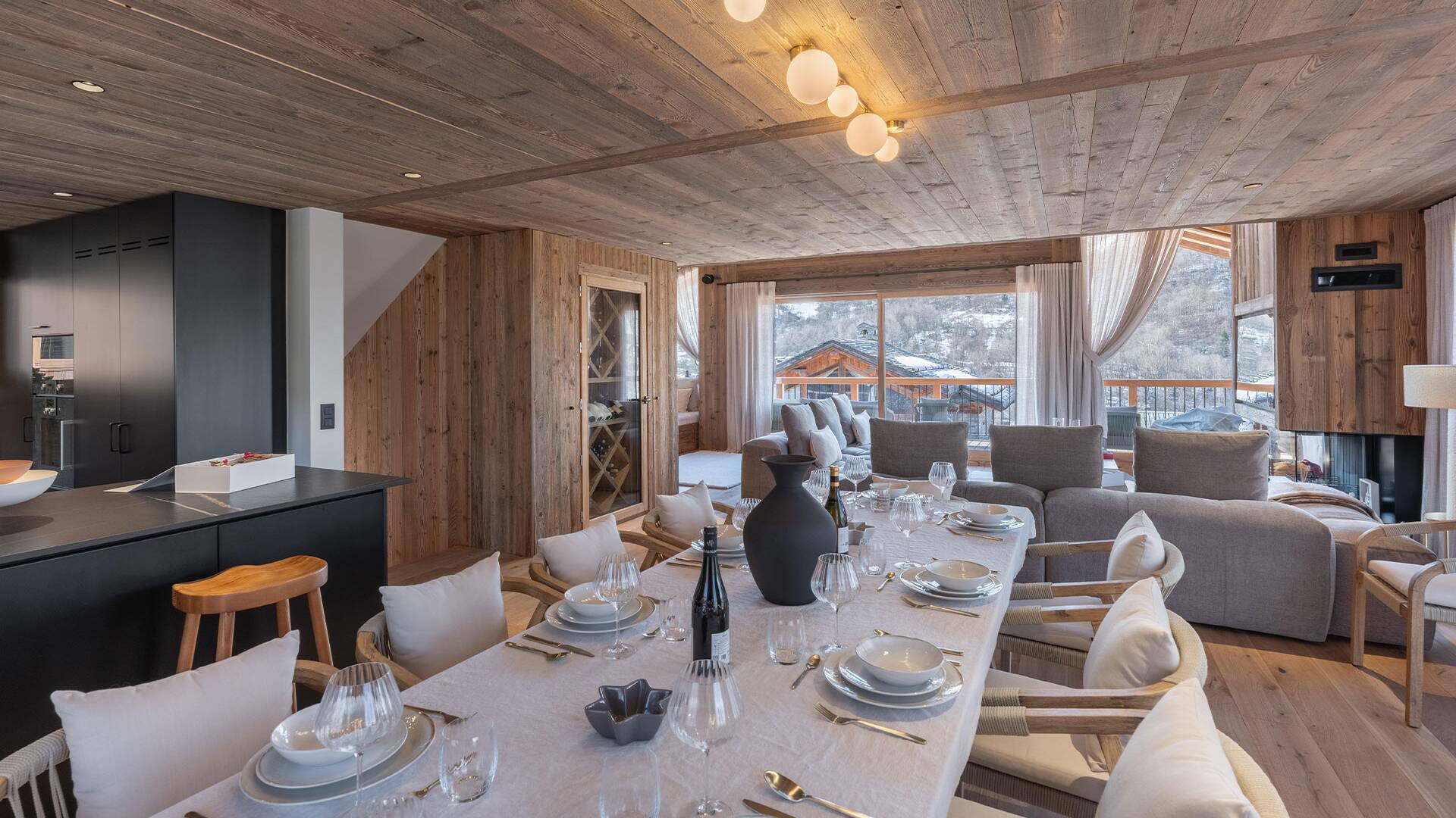 spacious dining area with French windows and view over snowcapped surroundings