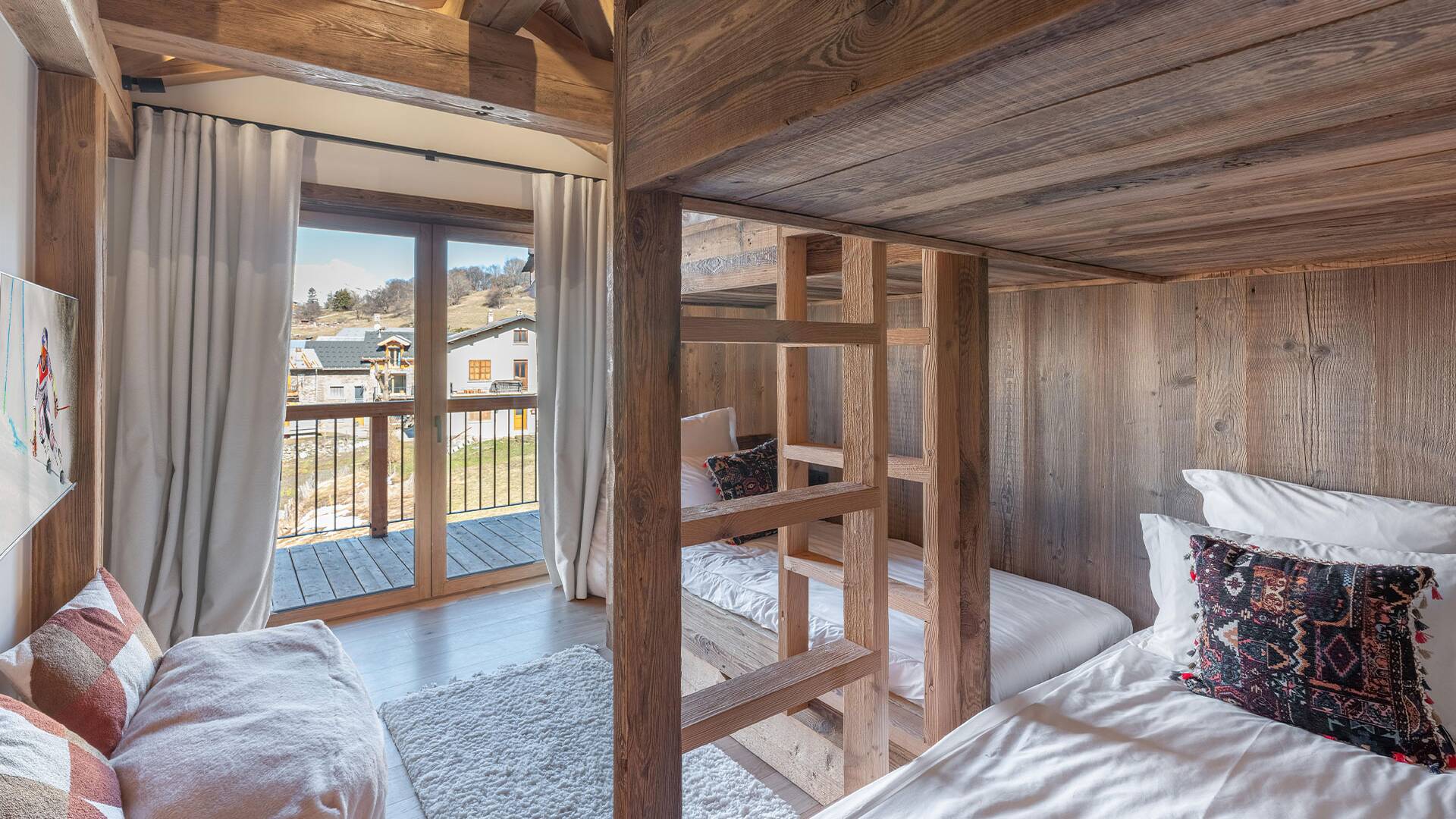 quadruple bedroom with 2 sets of bunk beds