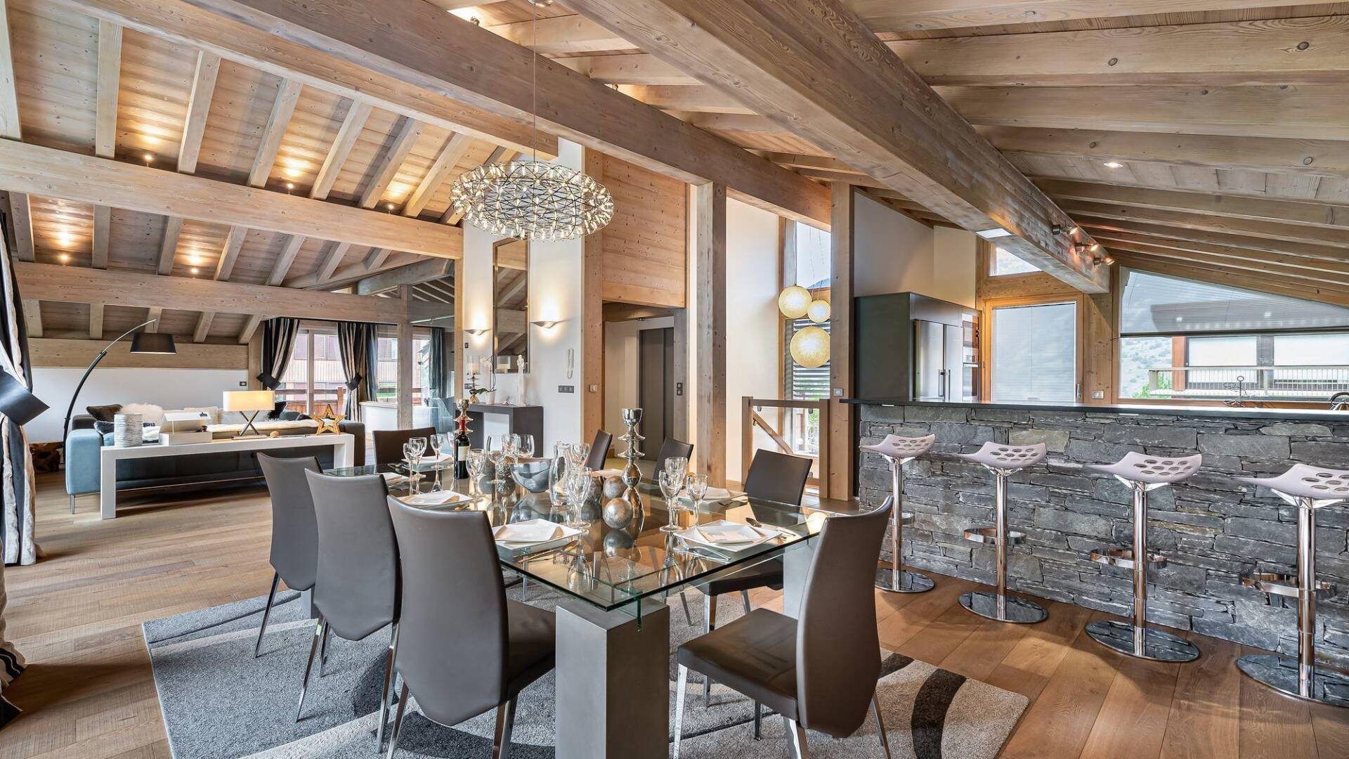 luxury dining area and fully-equipped kitchen with counter bar