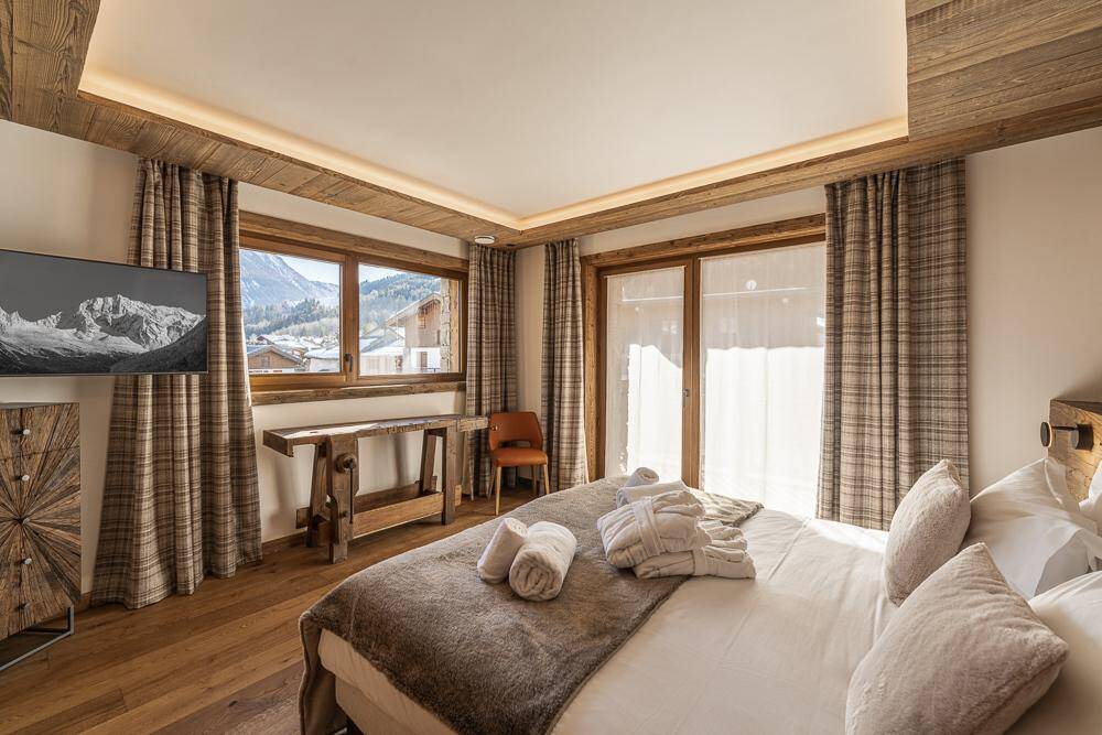 luxury double bedroom with TV