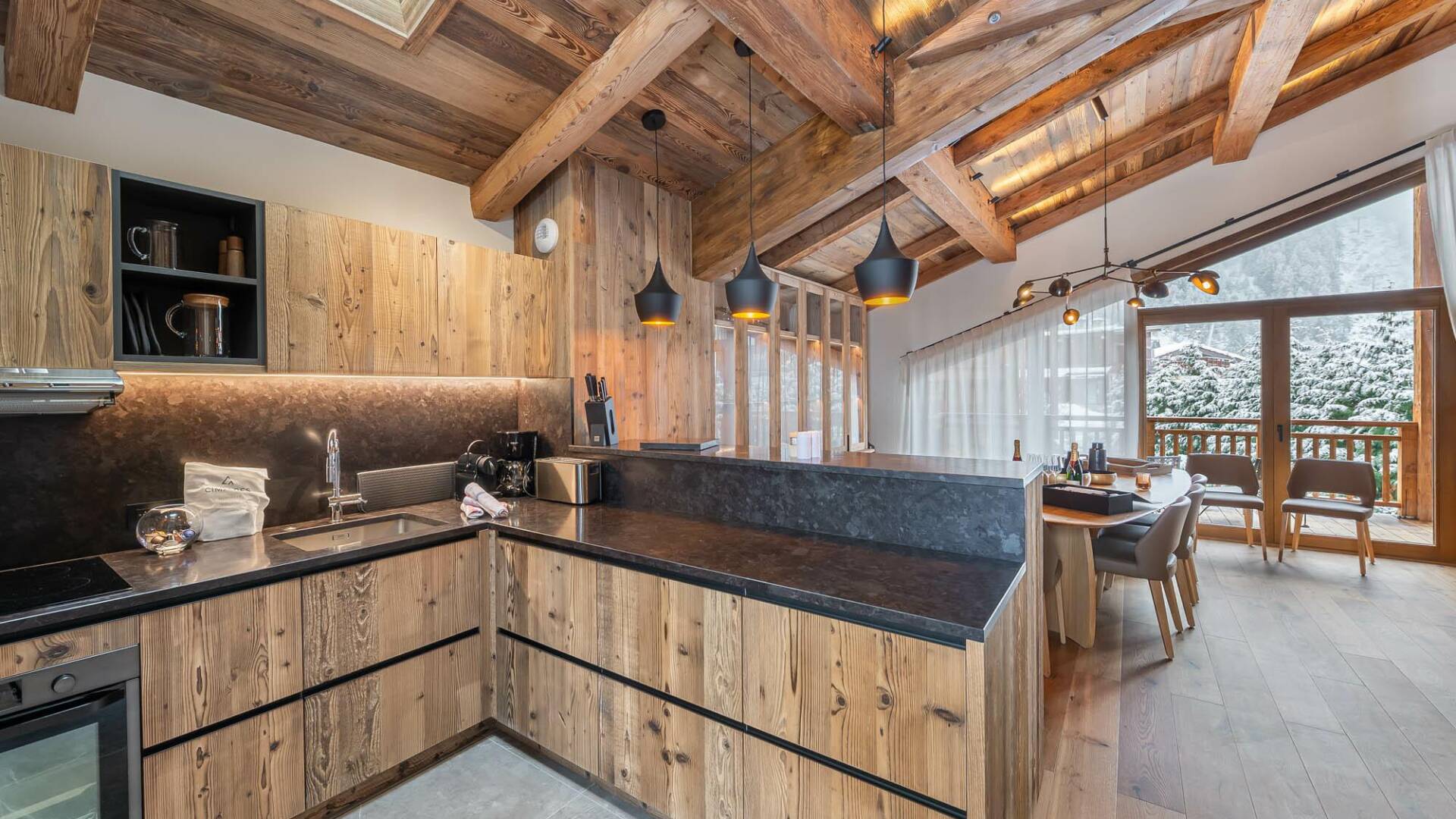 gourmet kitchen with dining area
