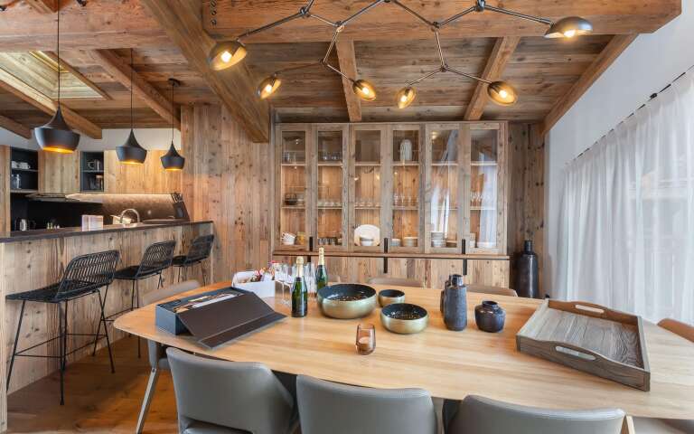 luxury dining area with open space kitchen