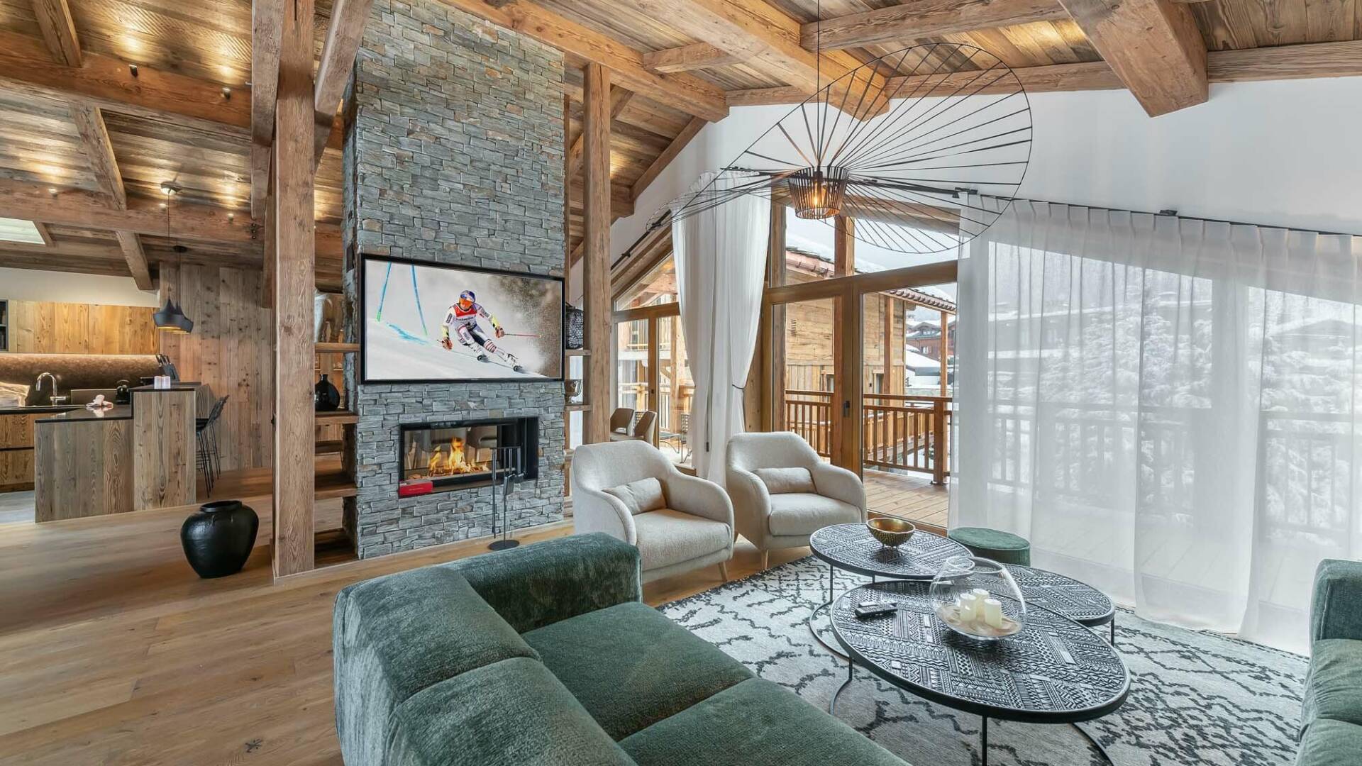 luxury living room with high-end furniture, TV and fireplace