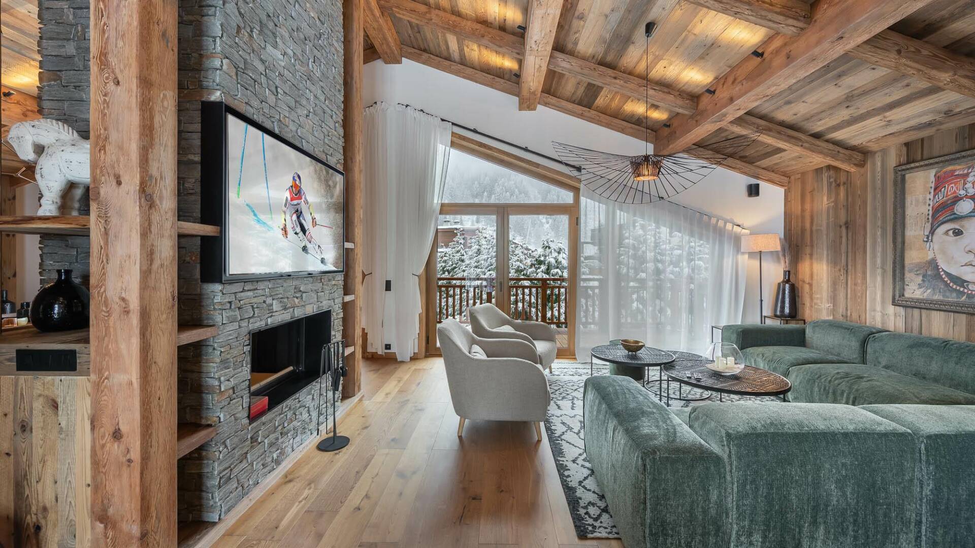 living room with large TV and access to outdoor