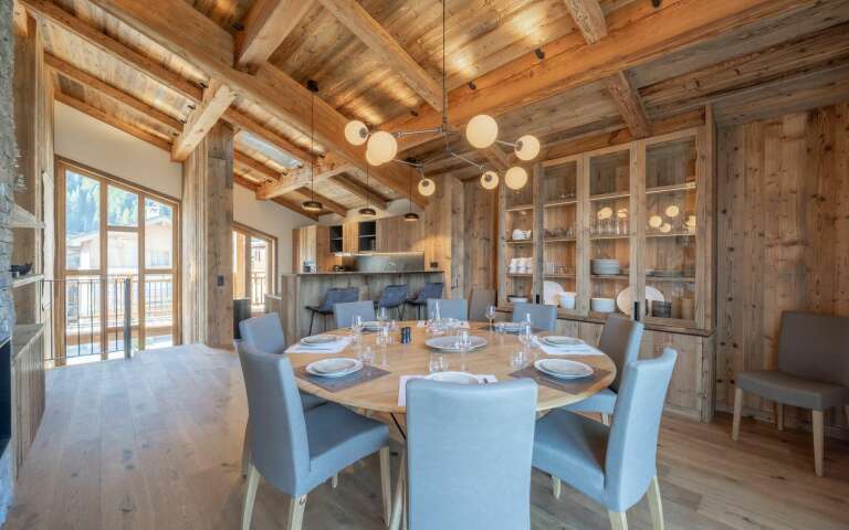 open space with dining area and fully equipped kitchen