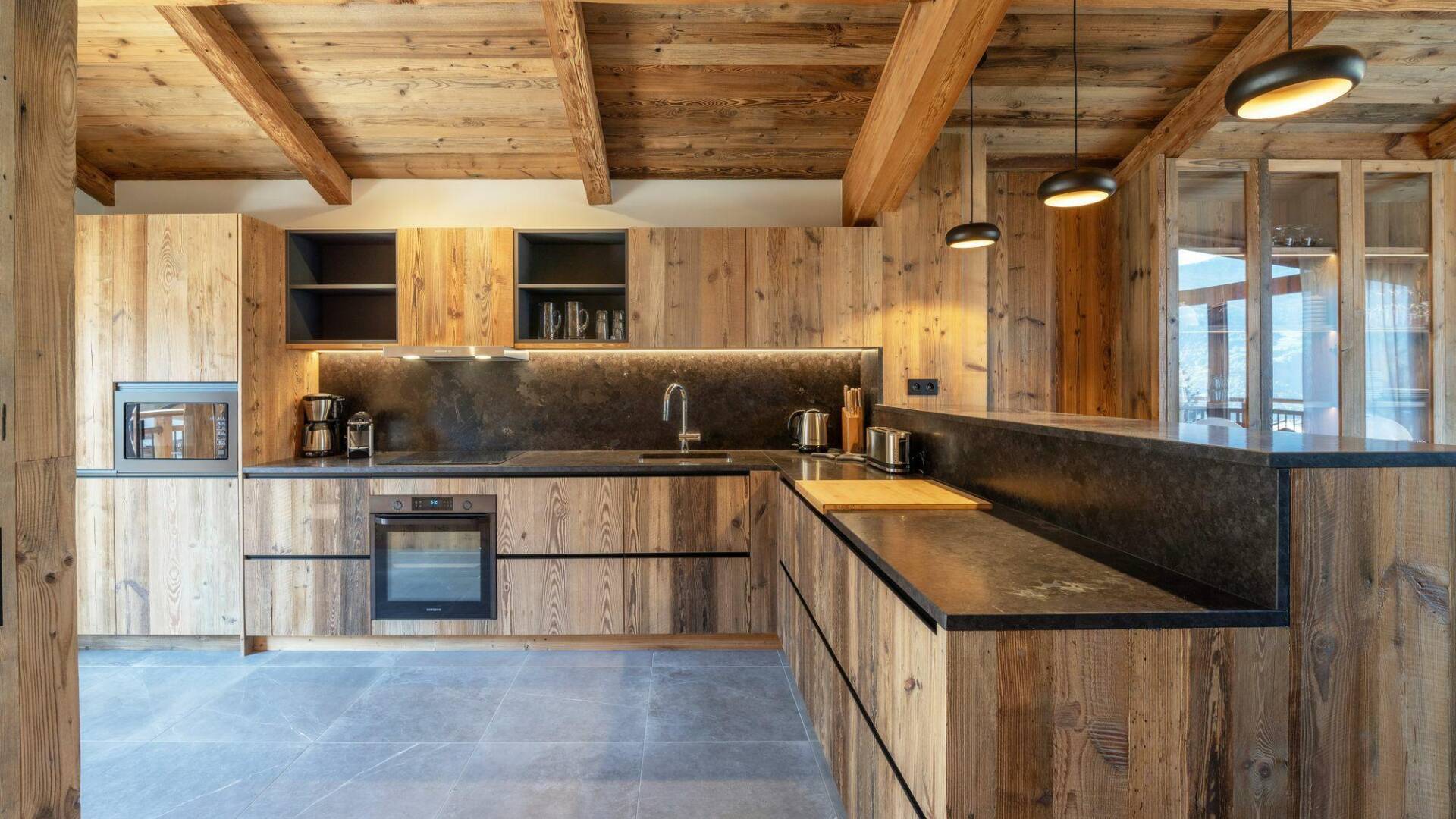 spacious kitchen with large cooking counters