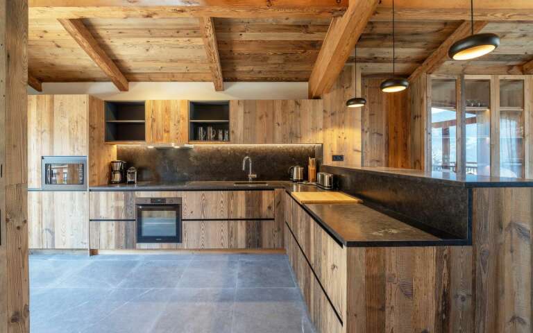 spacious kitchen with large cooking counters