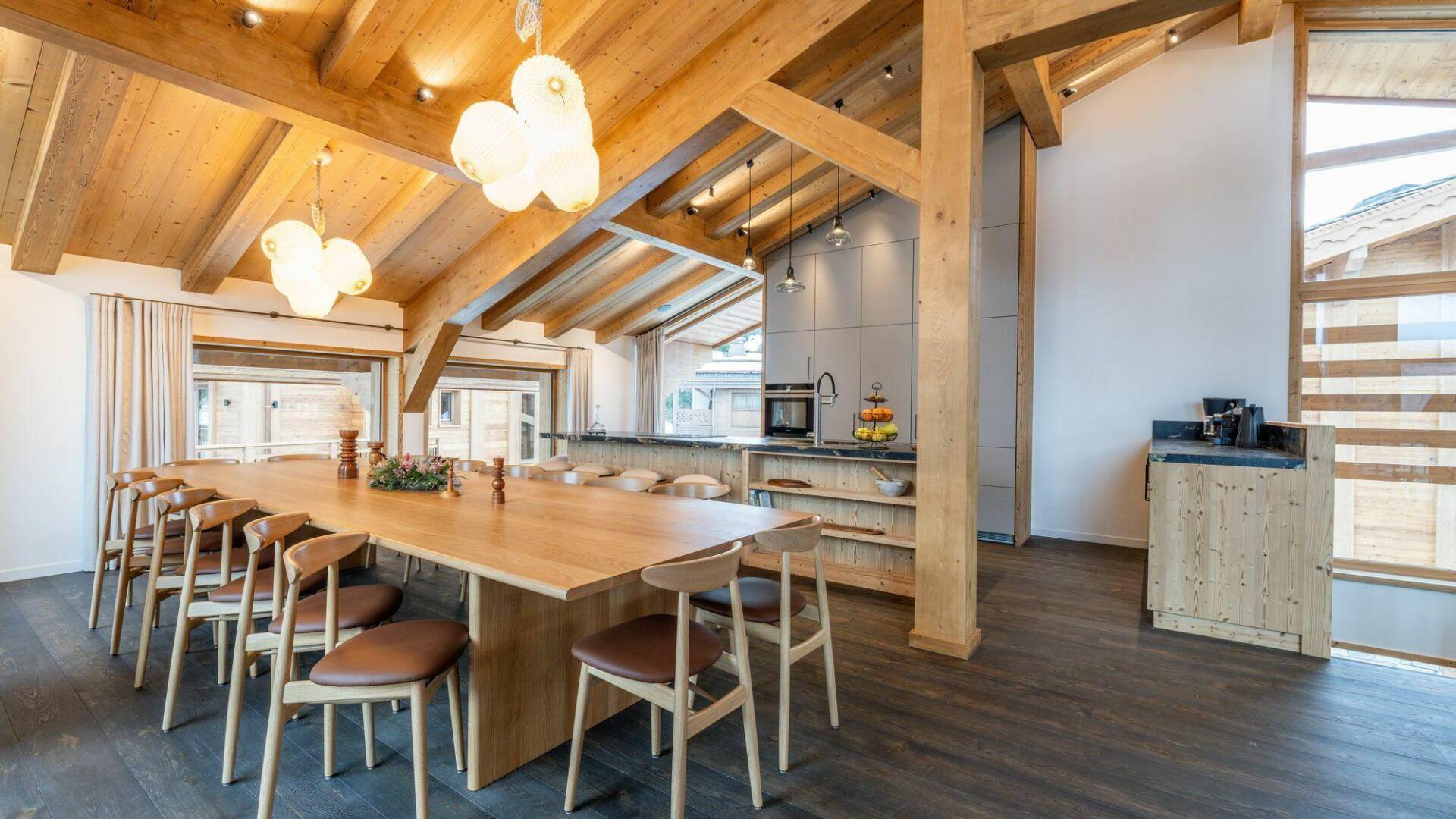 fully-equipped gourmet kitchen and dining table