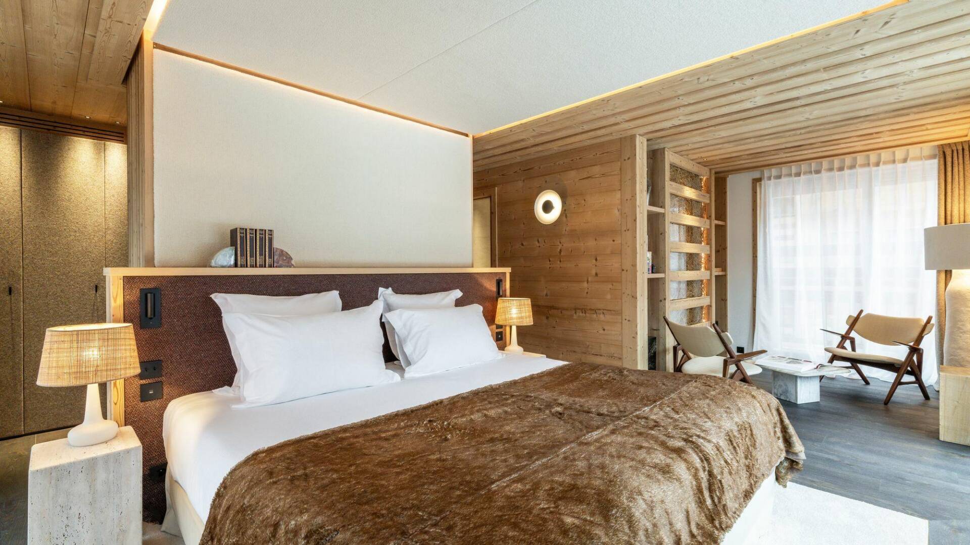luxury double bedroom with sitting area