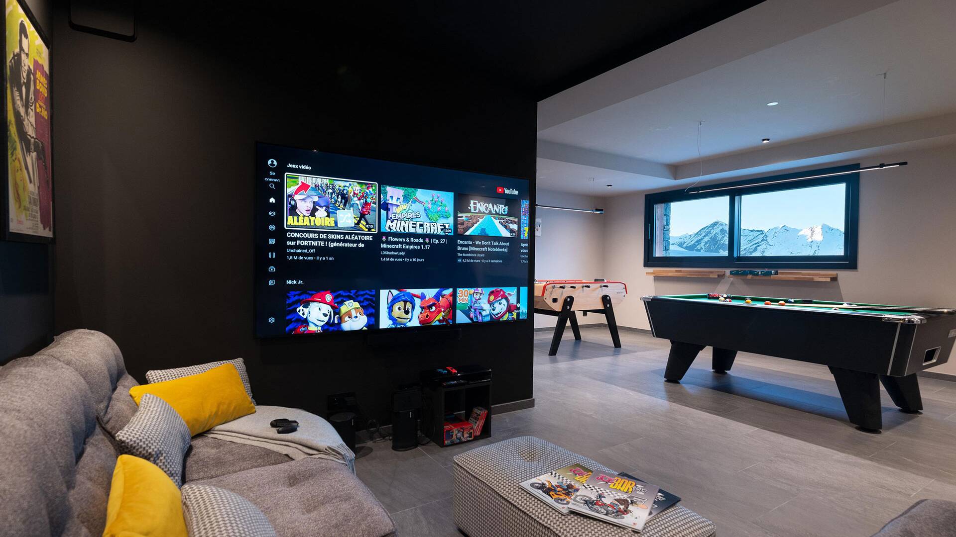 opulent TV room with billiard table
