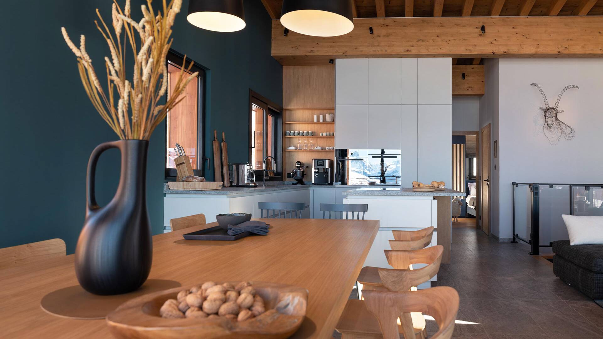 minimal dining area with wooden table