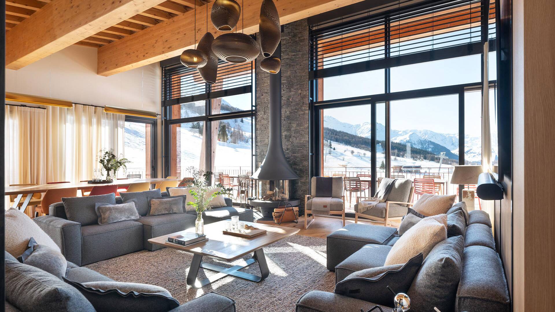 contemporary living room with French windows and fireplace
