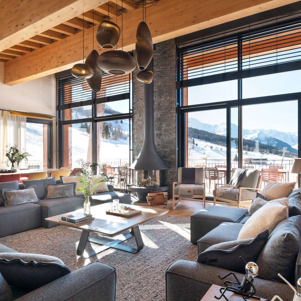 contemporary living room with French windows and fireplace